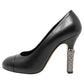 Chanel Black Leather Round Toe Metal Pearl CC Interlocking Logo Heels Pumps